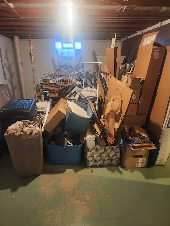 Roll-off dumpster container at job site for Concrete Dumpster Rental in Winchester